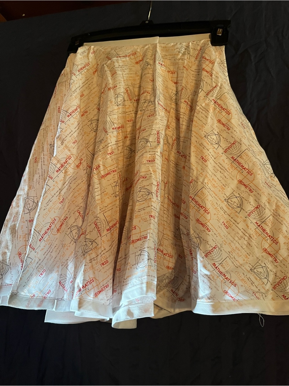 Cream Printed Flared Skirt with Red Script Accents